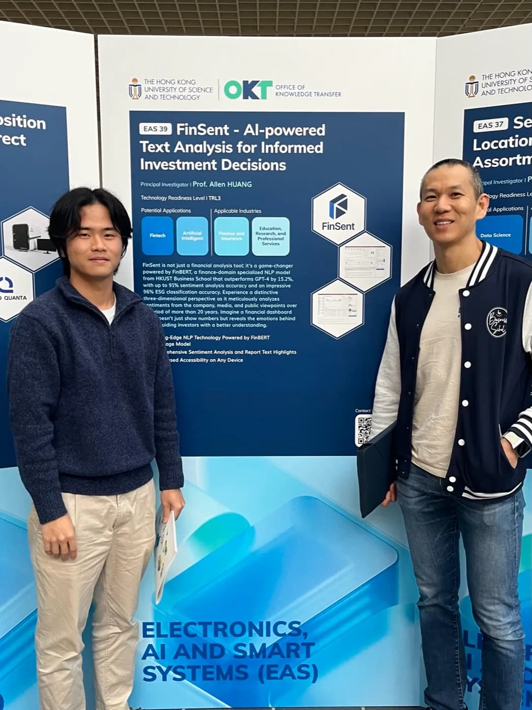 Jiwoo Shim with Prof. Allen Huang at the HKUST Office of Knowledge Transfer showcase, beside the FinSent exhibition board